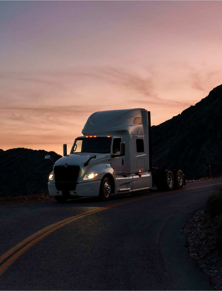 A truck cornering in the twilight