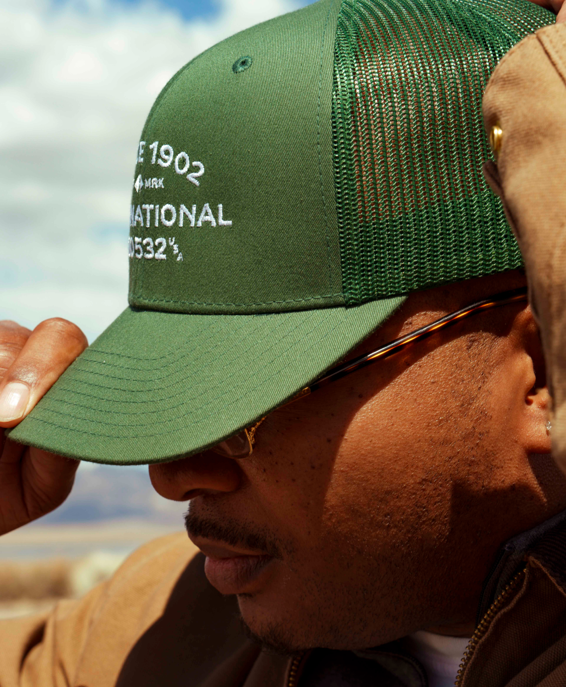 A green international cap