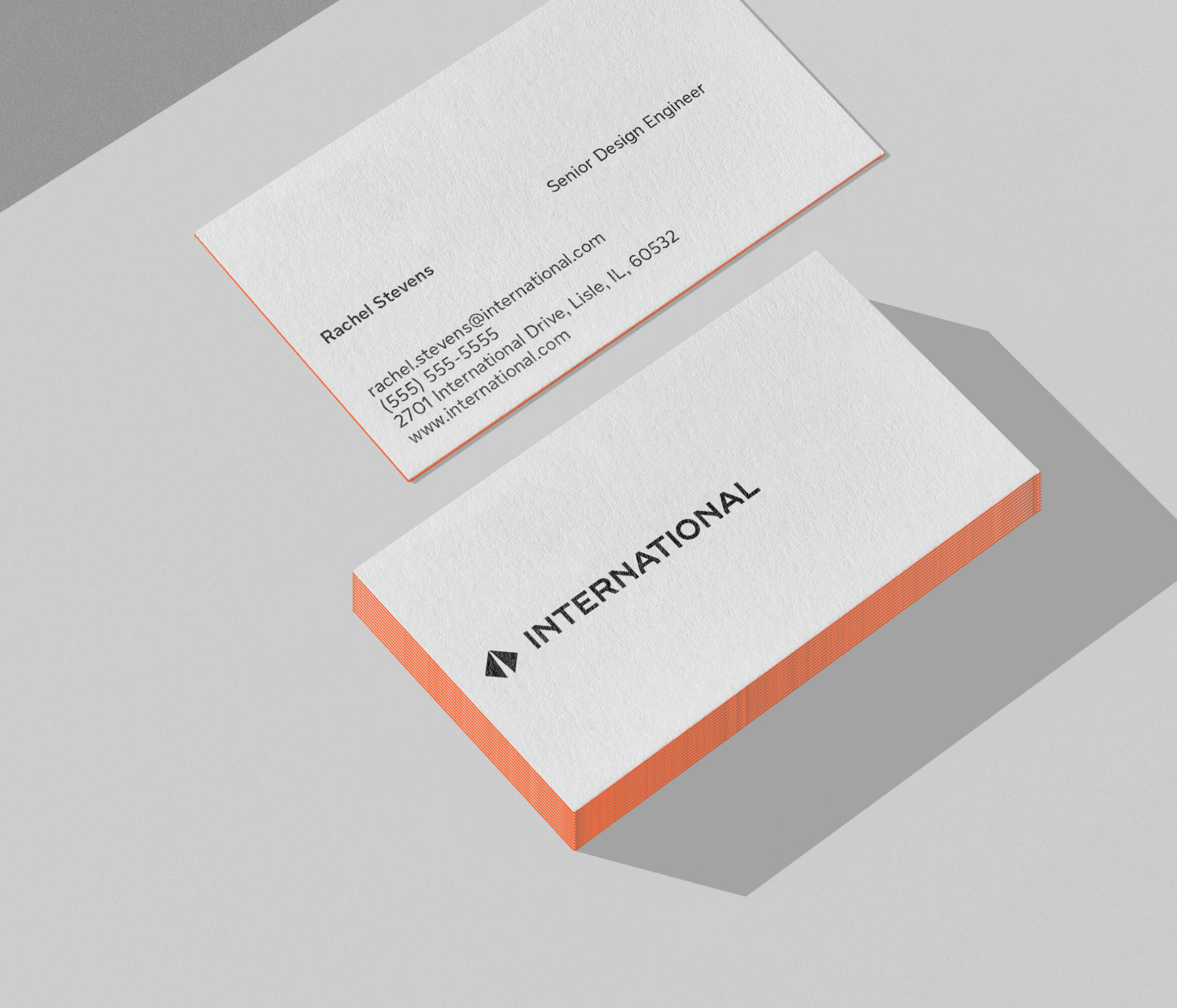 Example of using the orange accent on International business cards